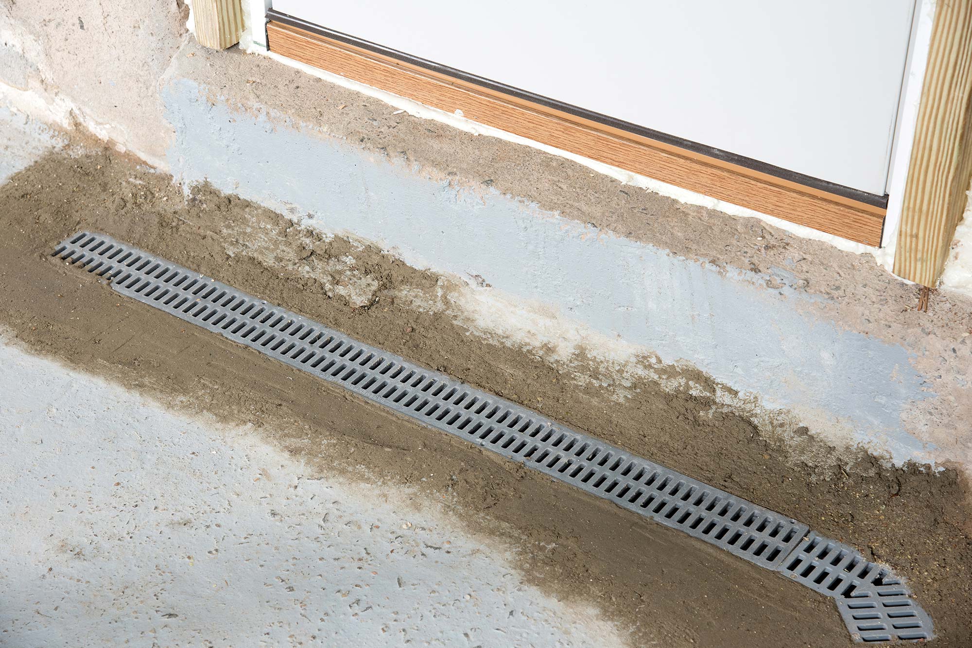 Grated Drain Pipe - APS Foundation Repair and Waterproofing